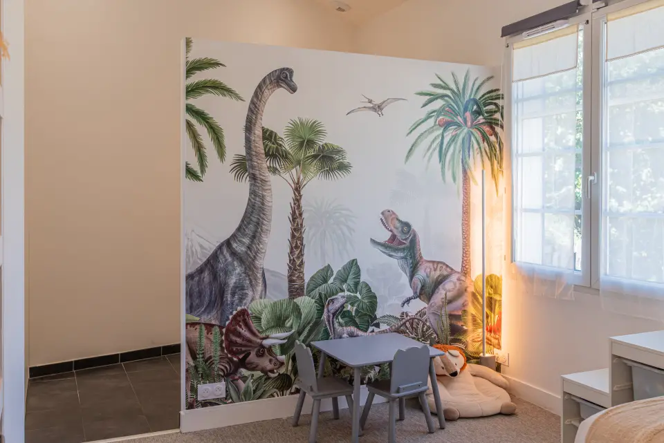Le coin des enfants et sa fresque dinosaures